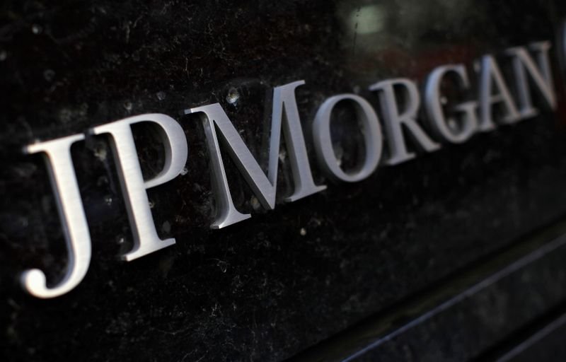 JPMorgan, Wells Fargo, Uber Gain Premarket; Tesla Declines